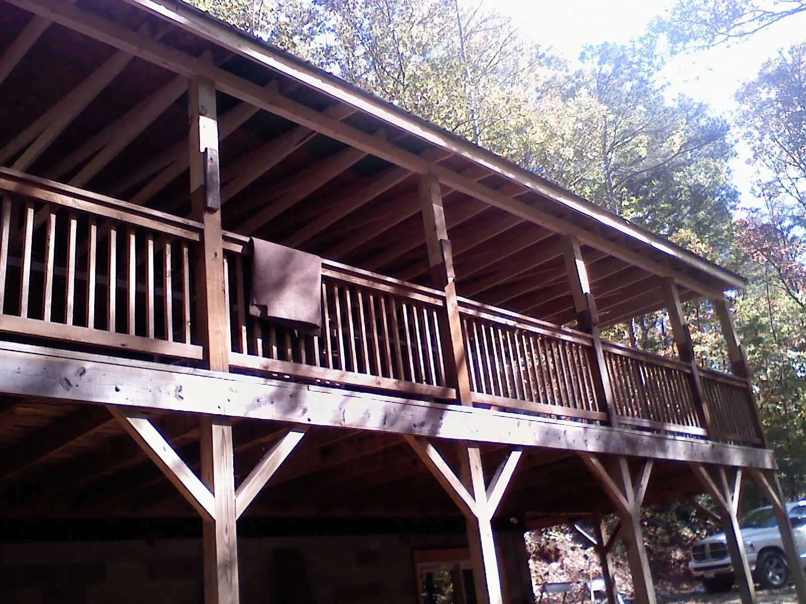 Timber framing under a new elevated porch and deck — Roof Leak Repair in North Norwich by Roofing Brothers